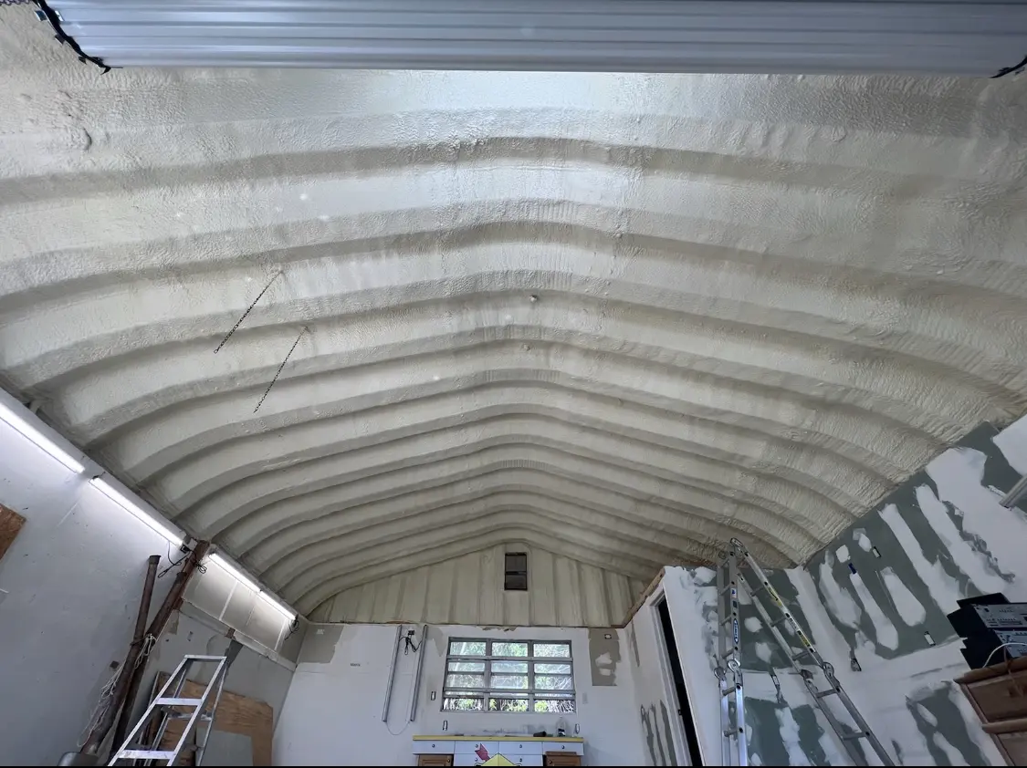 Spray polyurethane foam applied to the underside of a metal roof deck in Upper Hanover